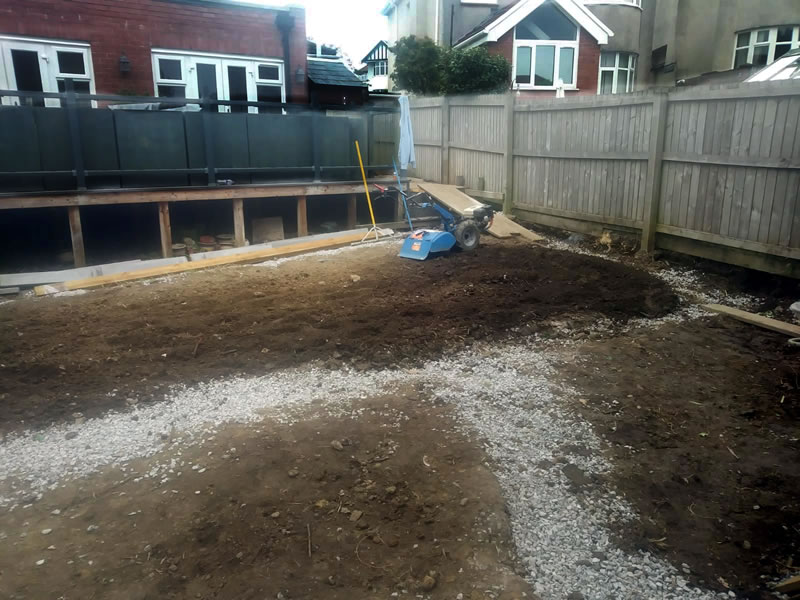 Sketty garden with new top soil and t shaped drainge made of chippings
